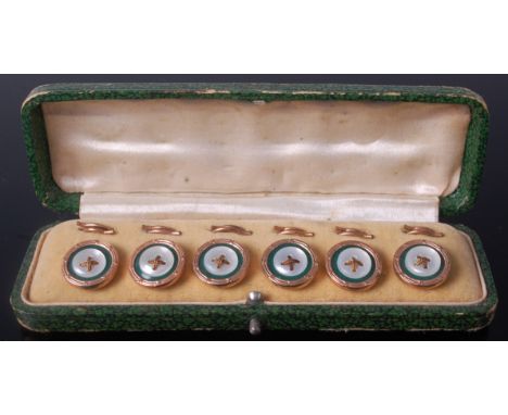 A cased set of six gilt metal dress buttons, each with mother of pearl and enamel fronts, having 9ct gold edges, early 20th c