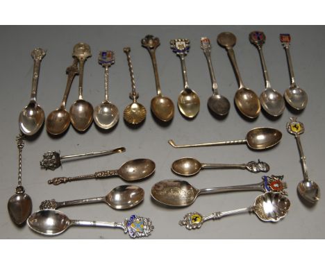 A late Victorian silver snuff spoon, together with various silver souvenir spoons 