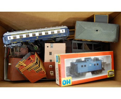 Two boxes containing a quantity of 00 scale lineside accessories and part complete rolling stock to include Hornby, Lifelike 