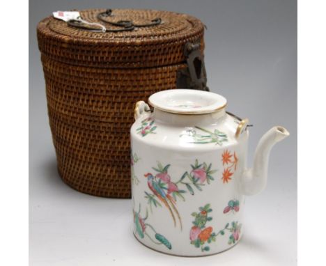 A Chinese glazed stoneware teapot in wicker case   Condition Report / Extra Information  Lid with light wear.Teapot with rest