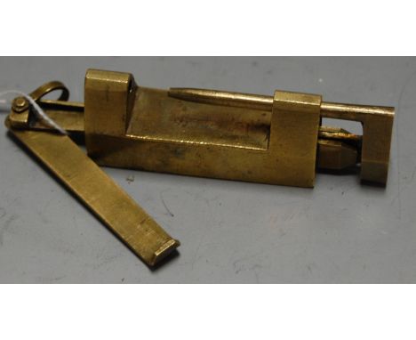 An early 19th century gilt bronze padlock, having sliding folding key with suspension loop and push-out action, 5cm (closed)
