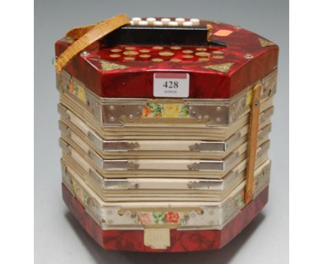 An East German nine button piano accordion 