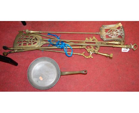 A set of three Victorian turned brass fire tools, comprising shovel, poker and tongs; together with one other shovel, pair of