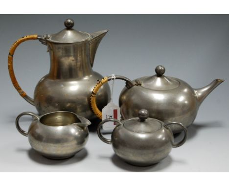 An early 20th century continental pewter four piece tea and coffee service of squat circular form impressed Royal Holland Pew
