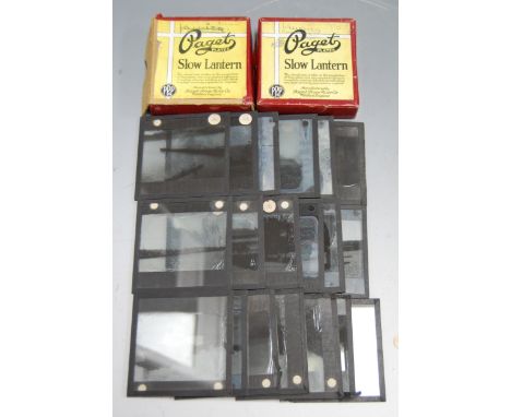 A collection of assorted boxed and loose magic lantern slides to include Paget slow lantern examples