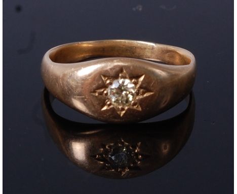 A yellow metal diamond solitaire ring, the Gypsy set old cut diamond weighing approx 0.14ct, 5.1g, size K