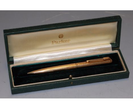 A Parker 9ct gold cased propelling pencil having engine turned decoration in fitted green leather Parker case