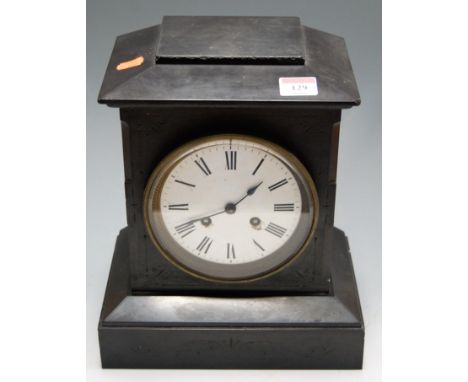 A late Victorian black slate cased mantel clock, of architectural form, having enamelled dial with Roman numerals, eight day 