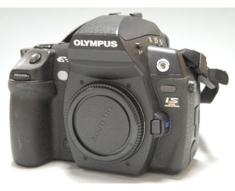 A boxed Olympus E3 digital SLR camera