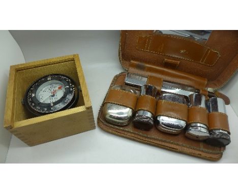 A Silva compass, made in Sweden and a gentleman's travel vanity set
