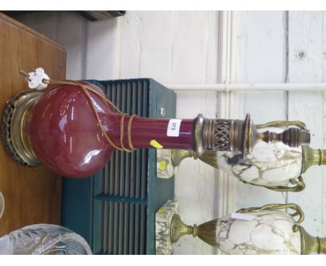 A sang de boeuf bottle vase, converted to a table lamp with brass fittings, total height 50 cm 