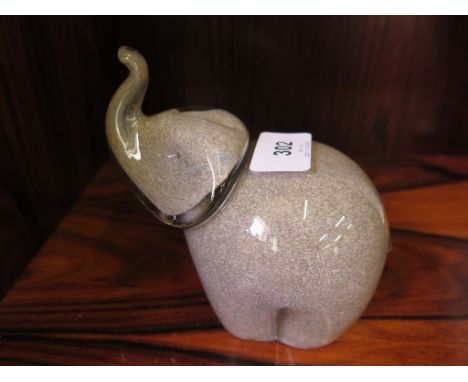A Wedgwood 1970's speckled grey glass elephant paperweight, with trunk raised and etched mark to the base 