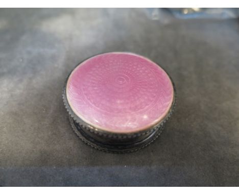 A silver and pink enamel patch box