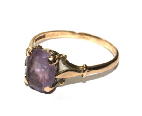 A 9 carat gold dress ring set with amethyst 