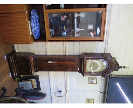 A George III mahogany longcase clock, the dial inscribed Peter Pohlmann, London, the hood with brass finials and fret carved 