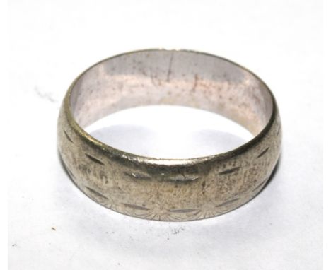 A 9 carat white gold wedding ring 