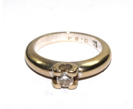 A single stone diamond ring of 0.24 carats set with 18 carat gold 