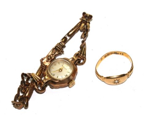 A small 18 carat ladies ring with small diamond to centre, and a ladies 9 carat gold watch 