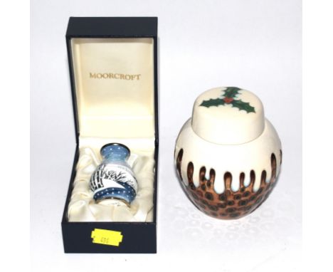 A Moorcroft enamel vase, with snow scene, 6 cm high, and a Moorcroft Pottery trial ginger jar and cover in Christmas pudding 