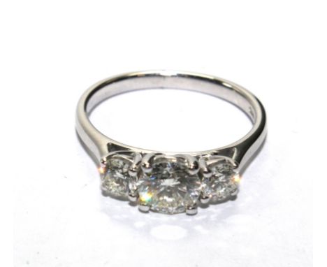 A ladies three stone diamond ring, set in 18 carat white gold 