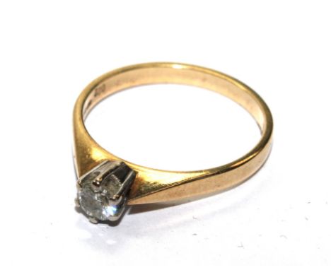 A single stone diamond ring, set in 9 carat gold 
