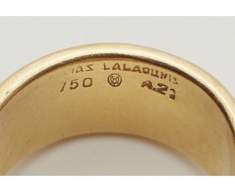 Ring im minoischen Stil18 kt Gelbgold. Breite gerippte Bandschiene. Ringkopf mit vier ziselierten Schlangenköpfen, jeweils ge