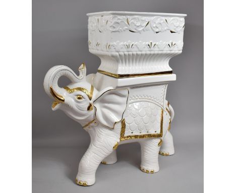 A Large Indian Ceramic Novelty Planter in the Form of Elephant with Trunk in Salute, White and Gilt Glaze, 73cm high 