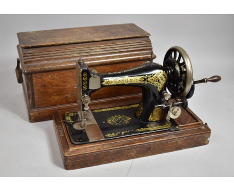 A Vintage Oak Cased Manual Singer Sewing Machine 