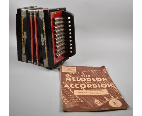 A Vintage German Melodeon with Instruction Booklet 