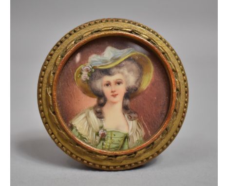 A Framed Circular Continental Miniature Portrait of a Maiden with Bonnet, 6.5cm diameter 