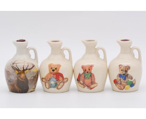 Twenty four assorted Rutherford's white ceramic decanters, blended Scotch whisky, Christmas issues, teddy bear series, each 5