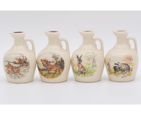 Twenty two assorted Rutherford's white ceramic decanters, blended Scotch whisky, farmyard scenes, wildlife of the British isl
