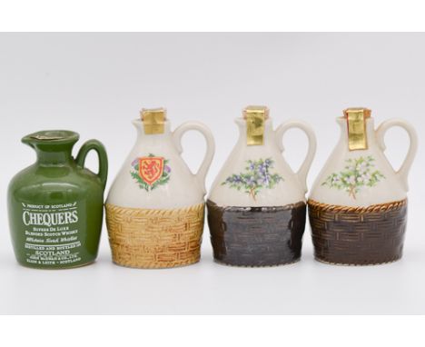 Twenty two assorted ceramic miniature whisky decanter jugs and flagons, including three Rutherford's jugs with baskets, Sterl