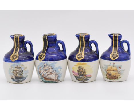 Twenty four assorted Rutherford's ceramic decanters, blended Scotch whisky, with nautical interest, including all white decan