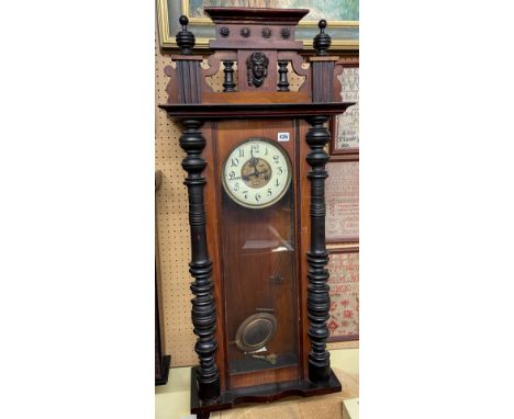 WALNUT CASED PENDULUM WALL CLOCK, FINIAL A/F