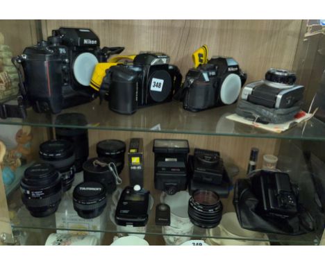 NIKON F4, NIKON 301 AND A NIKON F401, OLYMPUS TRIP 35 AND A SHELF OF VARIOUS NIKON AND TAMRON LENSES, FLASHES AND LIGHTMETERS