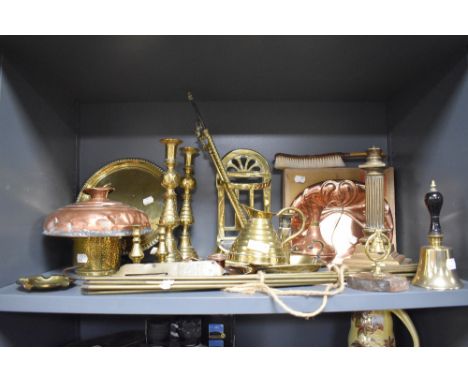 A good selection of brass and copper hardware including candle sticks lamp base and hand bell