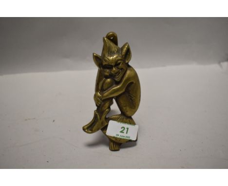 A Cornish Pisky brass door knocker.