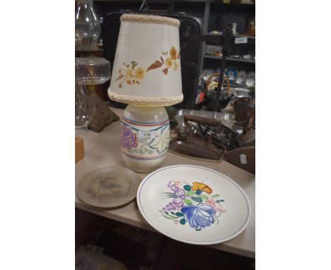Three pieces of Poole pottery including lamp base plate and pin dish