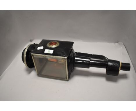 A antique carriage lamp, having belonged to Cedric Robinson,guide to the sands.