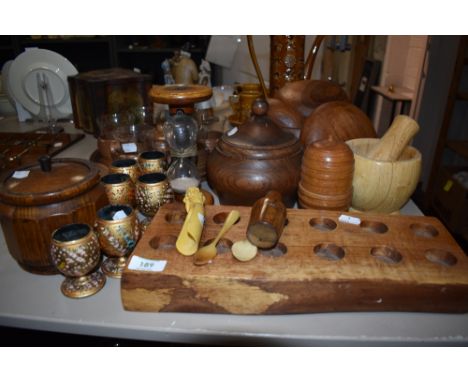 A selection of treen wood items including teak salad bowls, oak tea caddy and decorated egg cups
approx 29 items.