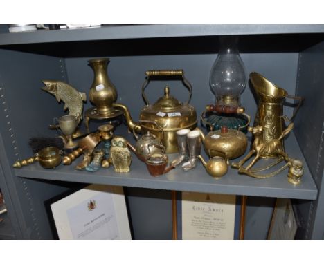 A selection of brass and similar including trivet, kettle, trinkets and more also included in a glass oil lamp with chimney.