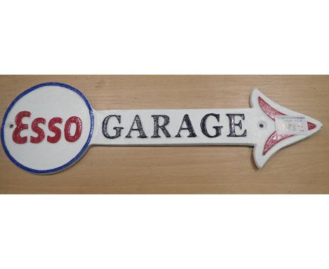 Cast iron Esso Garage arrow sign, 30 x 10 cm. P&amp;P Group 2 (£18+VAT for the first lot and £3+VAT for subsequent lots) 