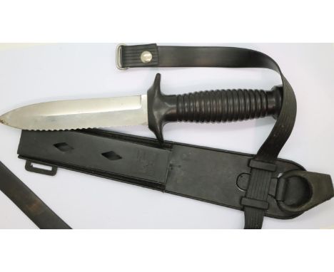 1970s Italian Pirelli divers knife with serrated blade, plastic sheath with rubber straps. P&amp;P Group 2 (£18+VAT for the f