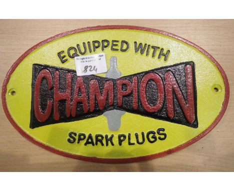 Cast iron Champion Spark Plug sign, D: 23 cm. P&amp;P Group 2 (£18+VAT for the first lot and £3+VAT for subsequent lots) 
