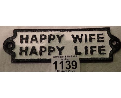 Cast iron Happy Wife plaque, 30 x 20 cm. P&amp;P Group 2 (£18+VAT for the first lot and £3+VAT for subsequent lots) 