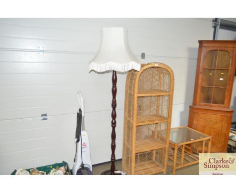 A standard lamp and shade 