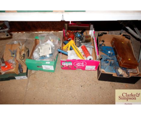 Four boxes of various hand tools to include oil cans, scales, clamps etc