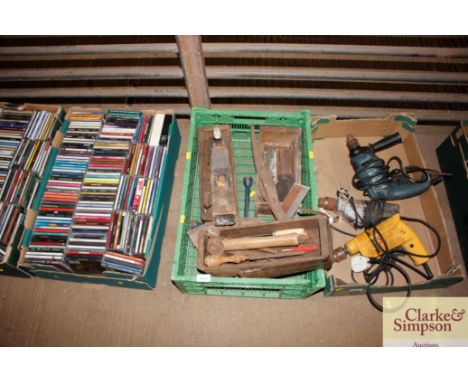 A box containing various hand tools to include planes; fire basket etc.