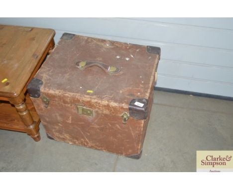 A canvas and leather mounted trunk